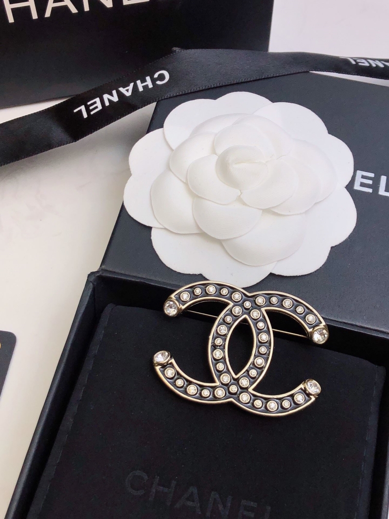 Ch**el brooches